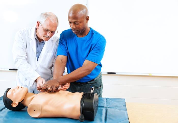 instructor teaching cpr